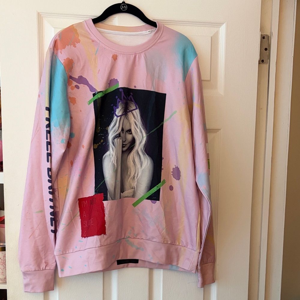 Pastel Pink Graphic Pullover Hoodie with Portrait and Paint-Splash Accents